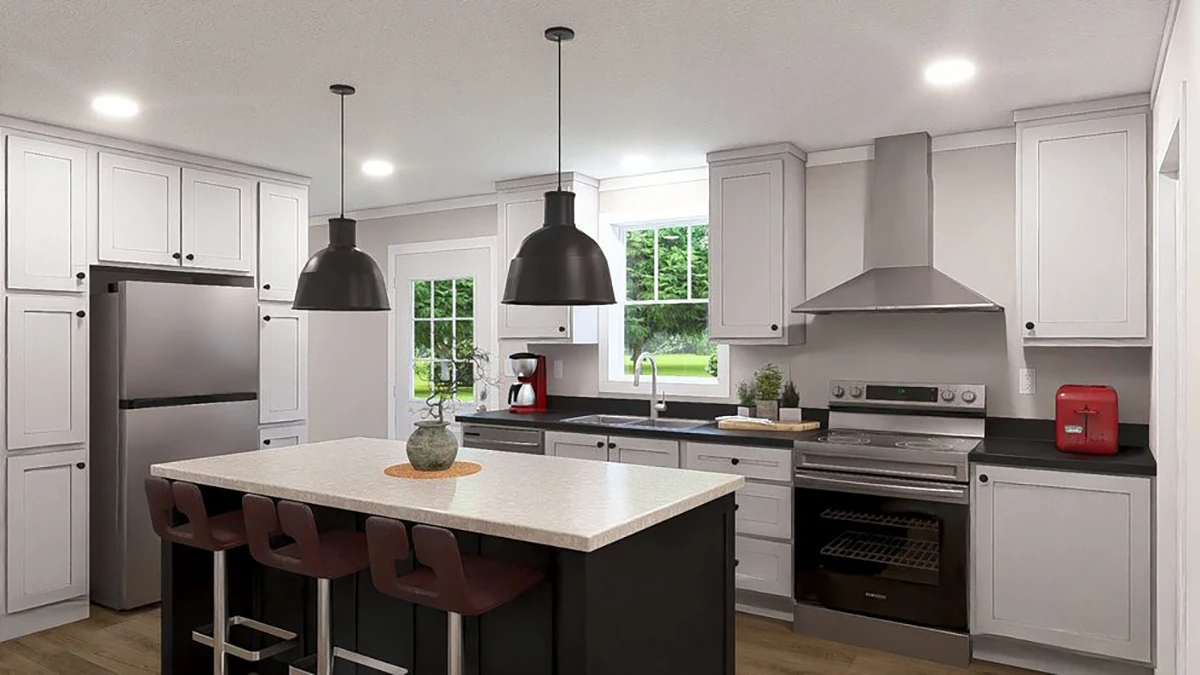 Modern kitchen with white cabinets, stainless steel appliances, a center island with three chairs, pendant lights, and a window above the sink showing greenery outside.