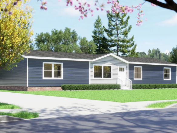 A single-story blue manufactured home with white trim, multiple windows, and a front entrance, surrounded by green grass and trees under a clear sky.