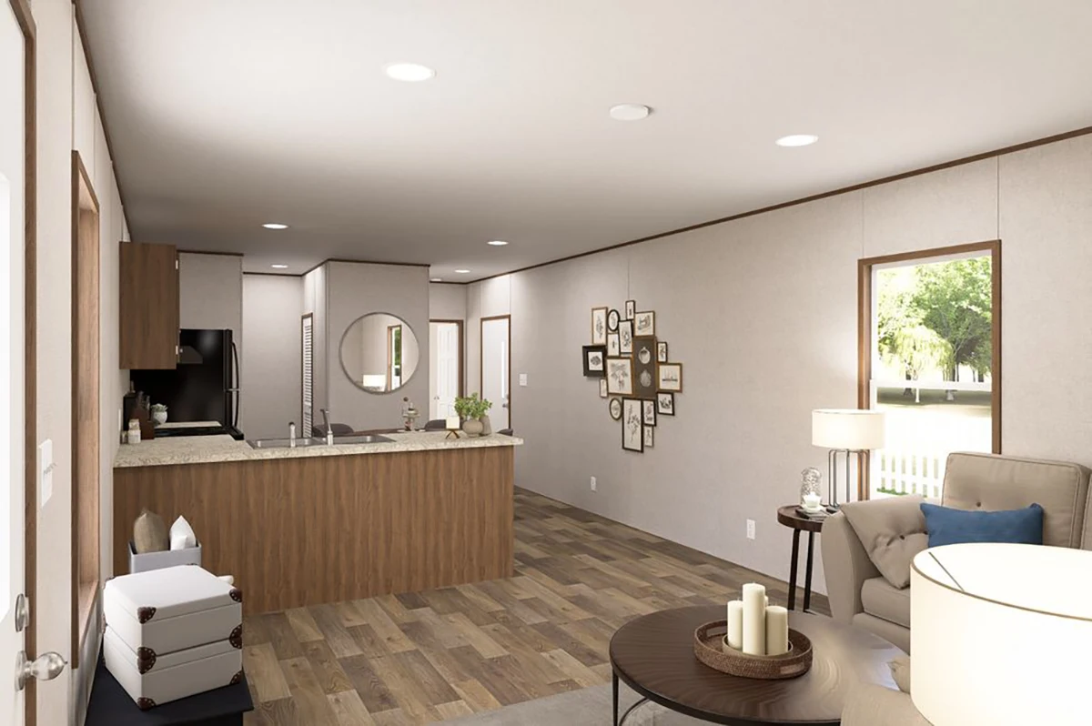 92743a6a-ce33-43f8-b72a-acc57c9eb145 Modern open-concept living room and kitchen with wood flooring, neutral walls, a wall of family photos, and large windows letting in natural light.