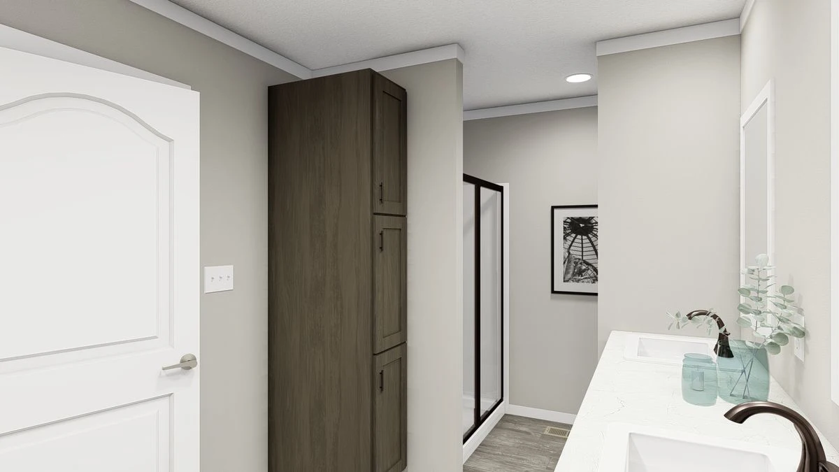 Modern bathroom with a double sink vanity, white countertop, dark wood cabinet, glass shower enclosure, wall art, and minimal decor.