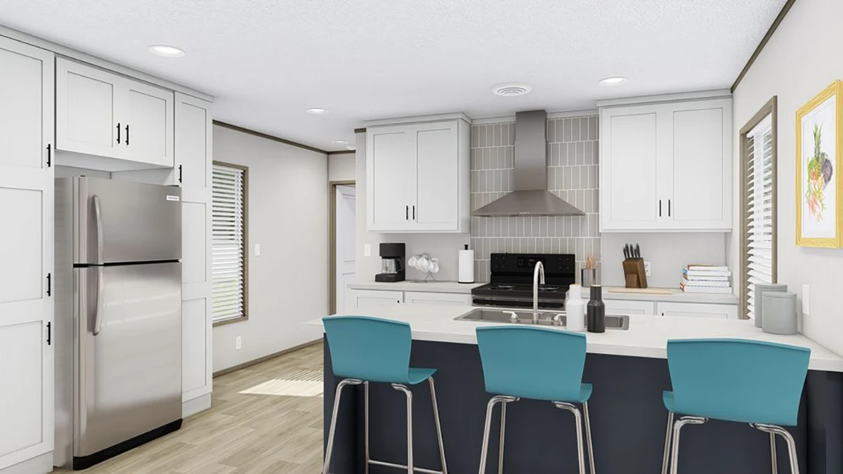 Modern kitchen with white cabinets, stainless steel appliances, an island with a sink, and three blue bar stools. A framed picture is on the wall to the right.