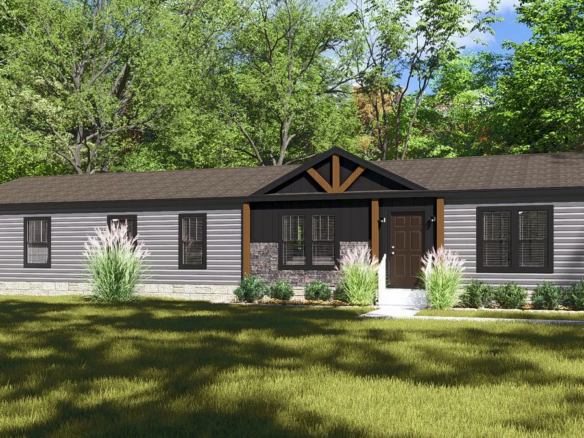 Single-story manufactured home with gray siding, dark roof, front porch with wooden beams, stone accents, and landscaped yard, surrounded by trees and a white fence.