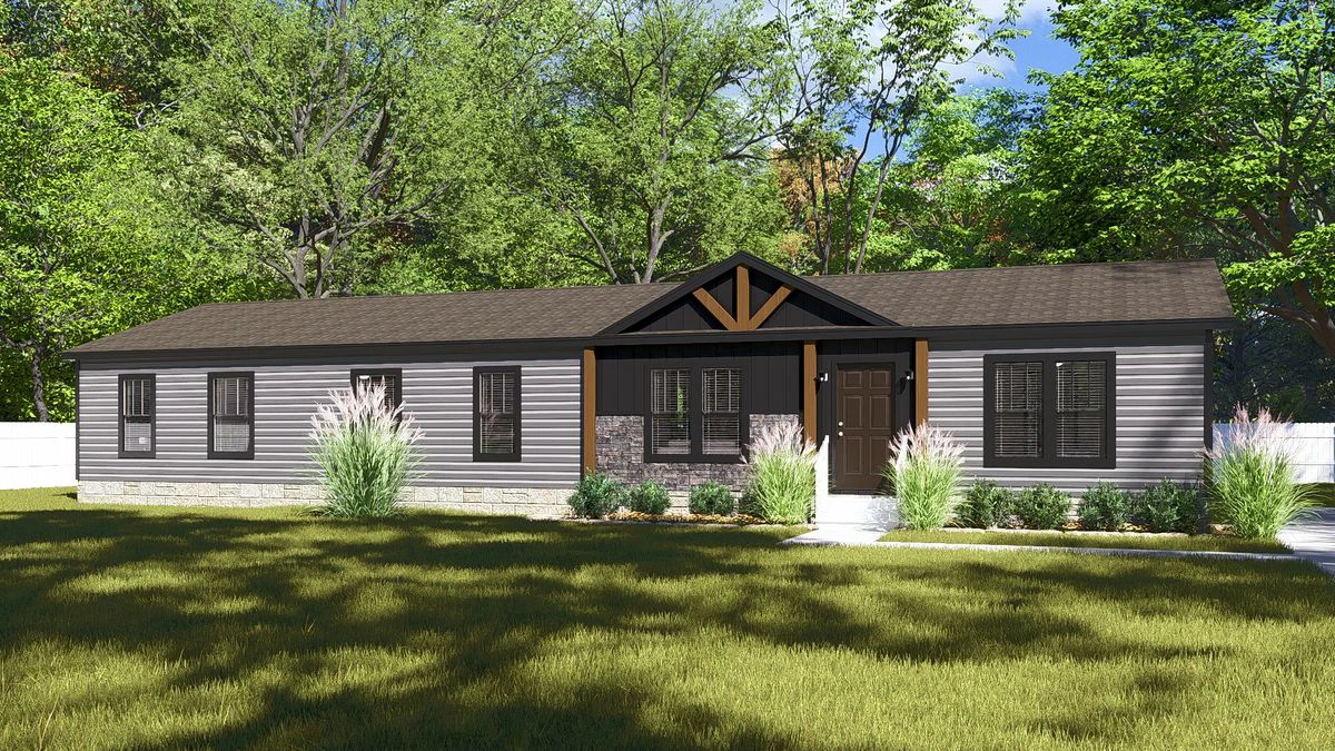 9d7ea927-83ab-4407-a4b0-0de030f8906d Single-story manufactured home with gray siding, dark roof, front porch with wooden beams, stone accents, and landscaped yard, surrounded by trees and a white fence.