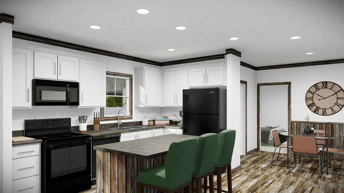 Modern kitchen with white cabinets, black appliances, a center island with two green chairs, wood accents, and an adjacent dining area with a round table and large clock on the wall.