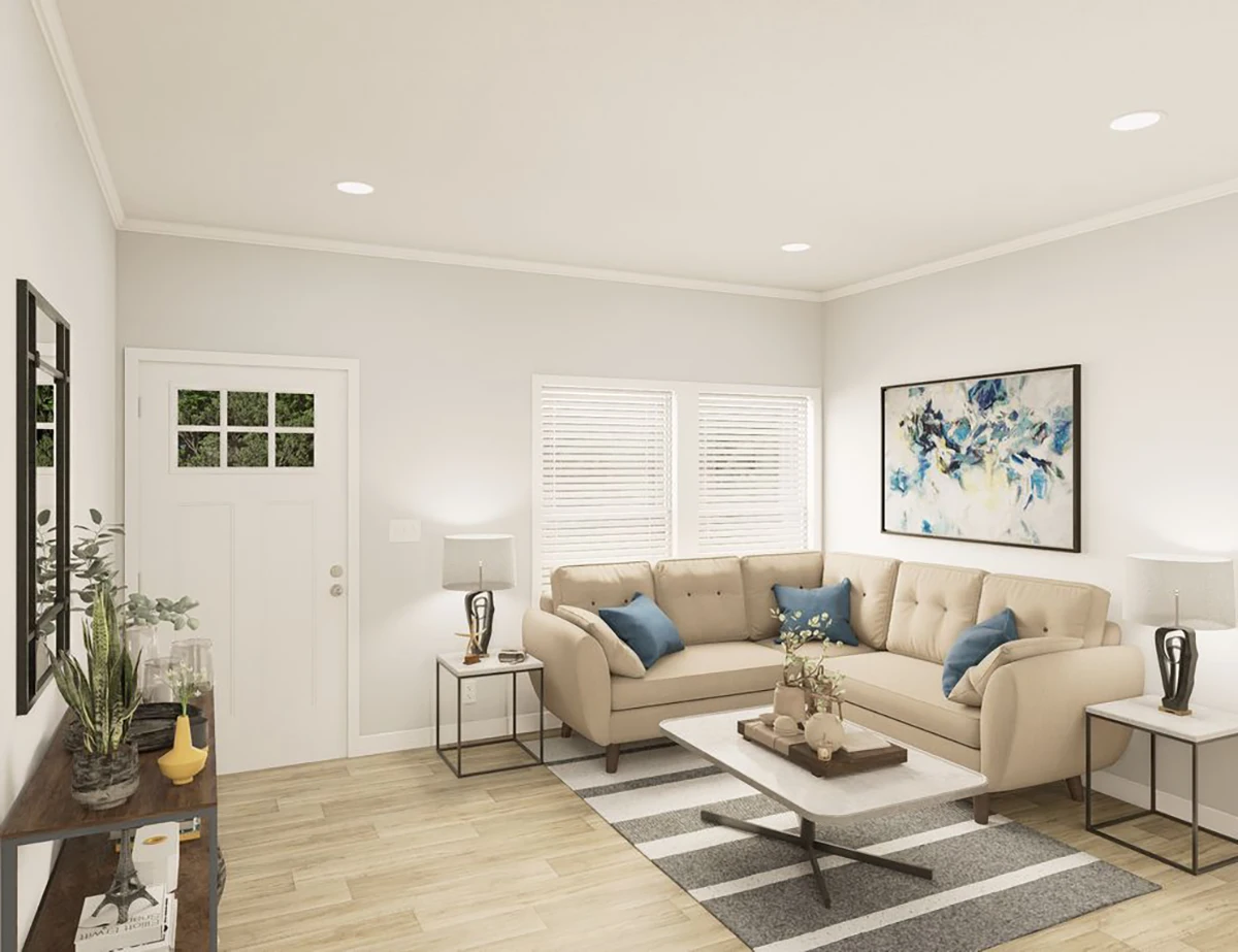 The Elite 52 16 Modern living room with a beige sectional sofa, blue accent pillows, a striped rug, coffee table, large floral wall art, and two windows with white blinds.