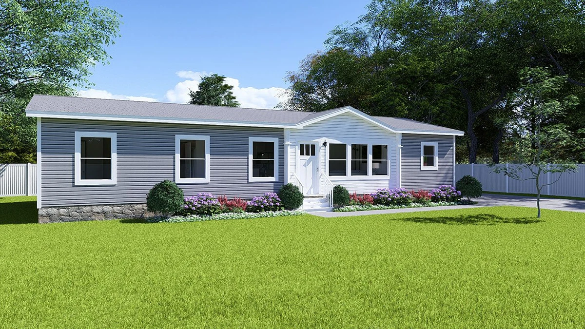 Single-story gray house with white trim, a central white door, and a landscaped garden in front, surrounded by green grass and trees.