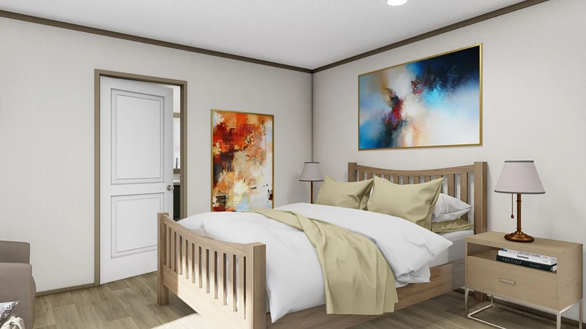A bedroom with a wooden bed, beige bedding, two bedside tables with lamps, abstract wall art, and a closed white door.