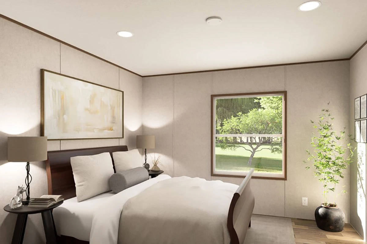 b920ff48-eeb8-4c1b-bcce-c2478725df4d A neatly made bed with pillows in a bright bedroom featuring a large painting, two bedside lamps, a window with a garden view, and a potted plant in the corner.