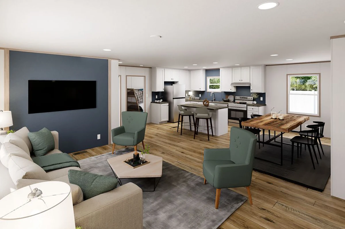 c72fe0ca-b404-4405-a19c-baf0de7f7ac5 Open-concept living area with a sofa, armchairs, TV, kitchen with white cabinets, island seating, and a dining table on wood flooring. Large windows provide natural light.