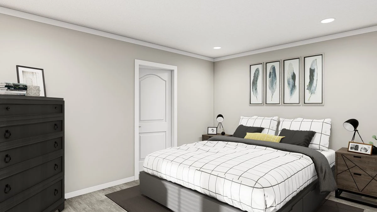 A modern bedroom with a neatly made bed, black dresser, two nightstands with lamps, and four abstract feather artworks on the wall.