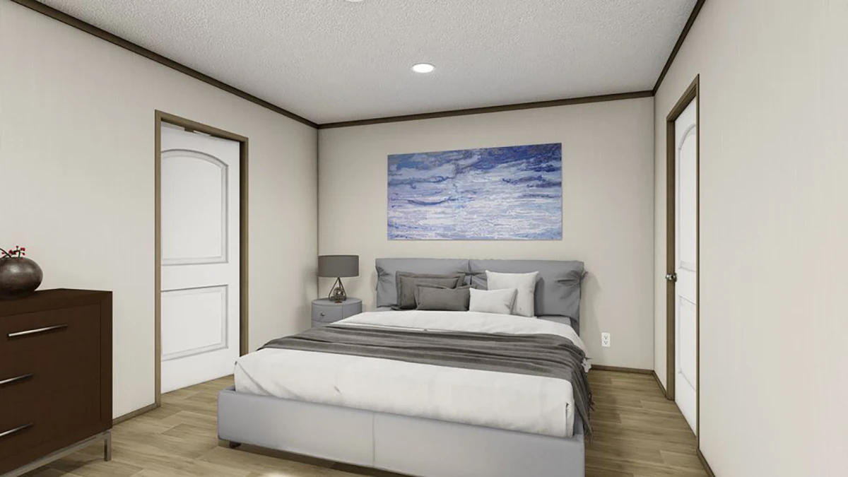 A simple bedroom with a bed, nightstand, lamp, dresser, and a large painting of blue and white clouds on the wall above the bed.