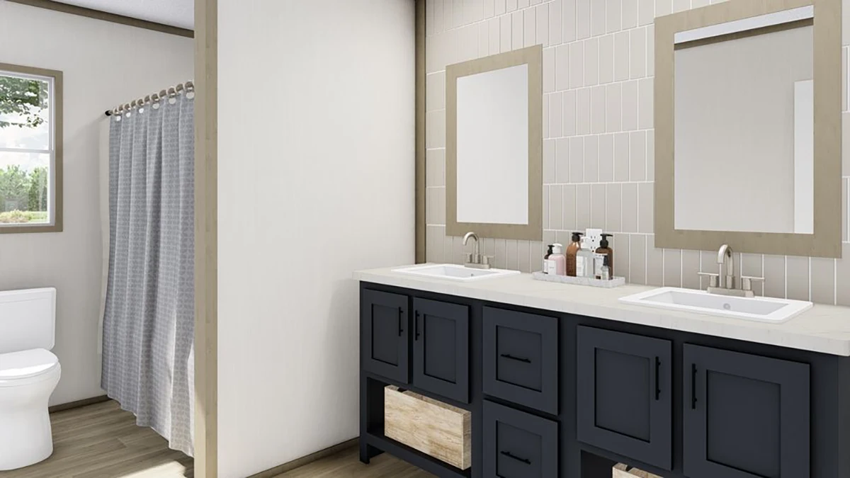 Modern bathroom with double sink vanity, two mirrors, a toilet, and a shower with a gray curtain. Light wood tones and neutral colors throughout.