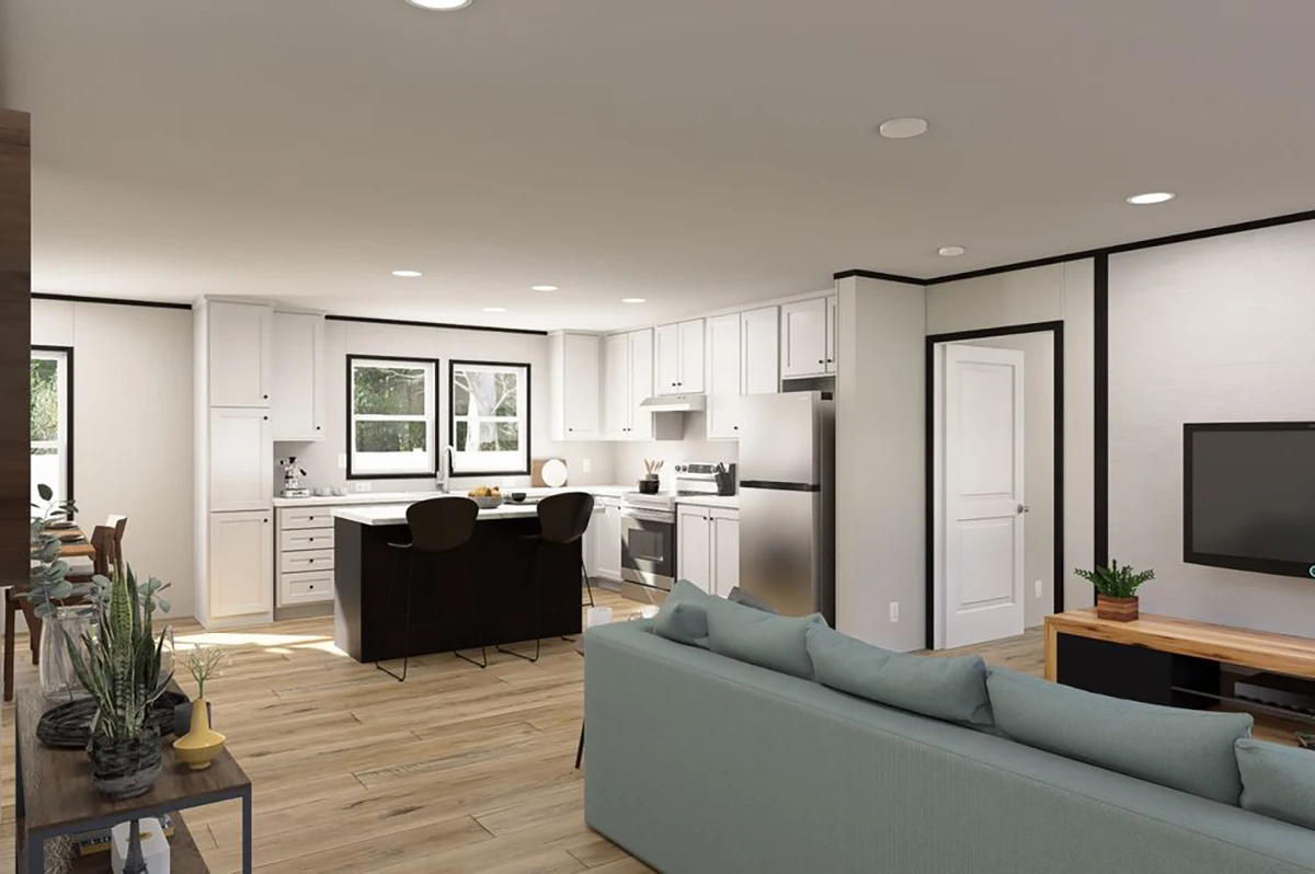 d8ad89a0-629d-4f52-ba03-52003682b2f3 Open-concept living room and kitchen with light wood flooring, a teal sofa, TV on a wooden stand, and a kitchen with white cabinets, stainless steel appliances, and an island.