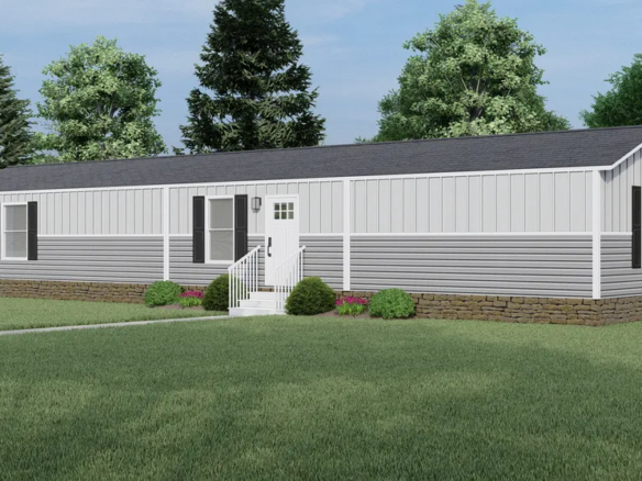 A single-story gray and white manufactured home with a small front porch, surrounded by grass, shrubs, and trees under a partly cloudy sky.