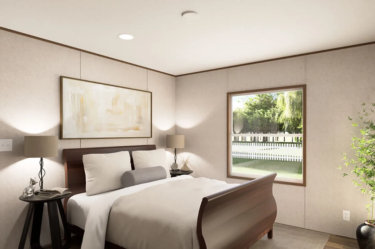 A modern bedroom with a sleigh bed, white bedding, two bedside tables with lamps, abstract wall art, a window with a view of a yard, and a potted plant in the corner.