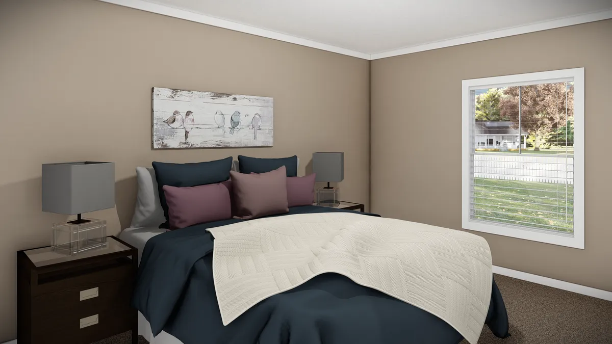 e1c973c2-ca1a-450a-877a-15203e8049d7 A neatly made bed with blue and purple pillows, a white quilt, dark nightstands with lamps, and a window showing a yard outside. A bird painting hangs above the bed.