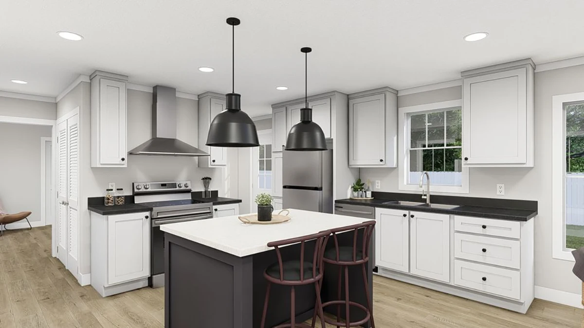 Modern kitchen with white cabinets, black countertops, stainless steel appliances, a central island with two chairs, and two large black pendant lights hanging above the island.