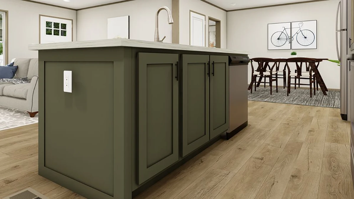 A kitchen with a green island, wood floors, stainless steel appliances, and a dining area with a bicycle artwork on the wall in the background.