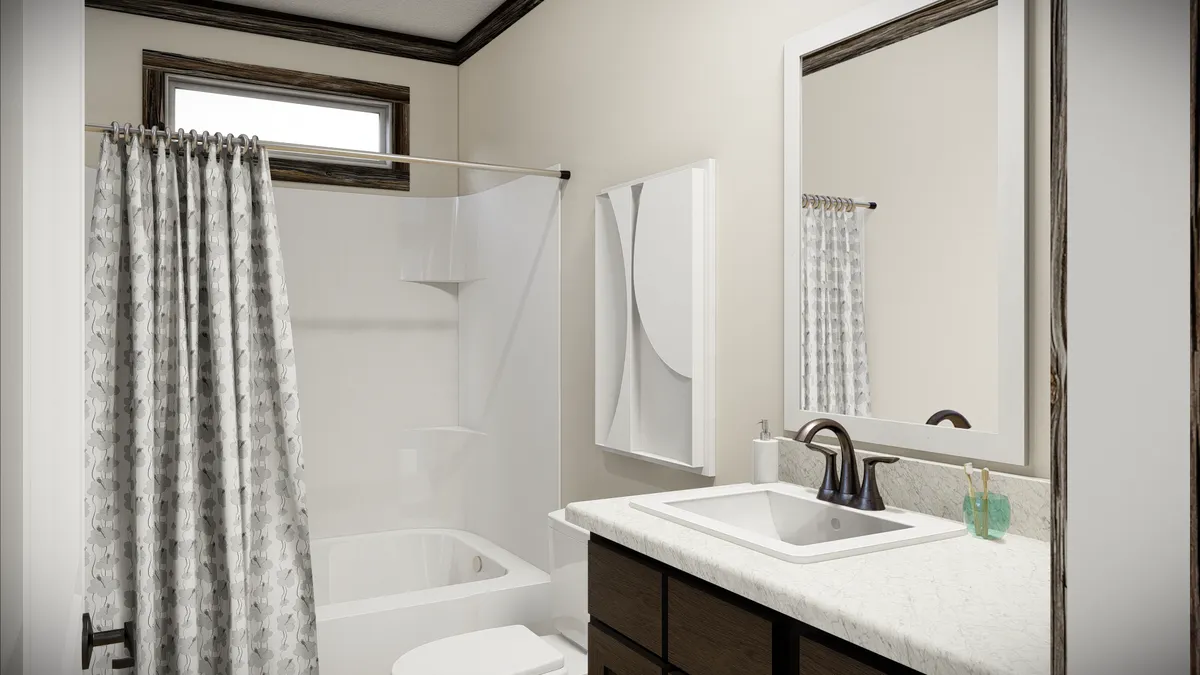 ec5f31c6-7d80-4e6d-b7d7-b2c264aa2b3f A modern bathroom with a bathtub and shower, a patterned shower curtain, a white sink with a dark faucet, a mirror, and a toothbrush holder on the counter.