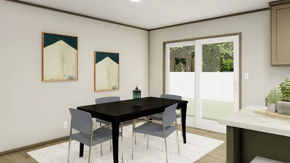 A dining area with a black rectangular table, four gray chairs, two abstract paintings on the wall, and sliding glass doors leading to a backyard.