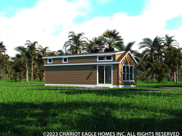 A small brown house with white trim sits on a grassy field surrounded by palm trees under a partly cloudy sky.