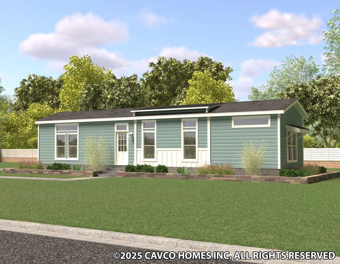 A modern single-story manufactured home with blue siding, white trim, large windows, and a landscaped front yard.