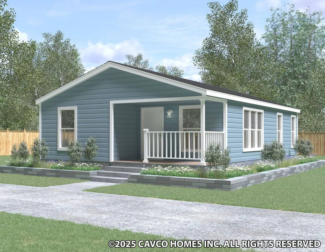 Single-story blue house with white trim, small front porch, and landscaped yard with shrubs and grass, surrounded by a wooden fence.