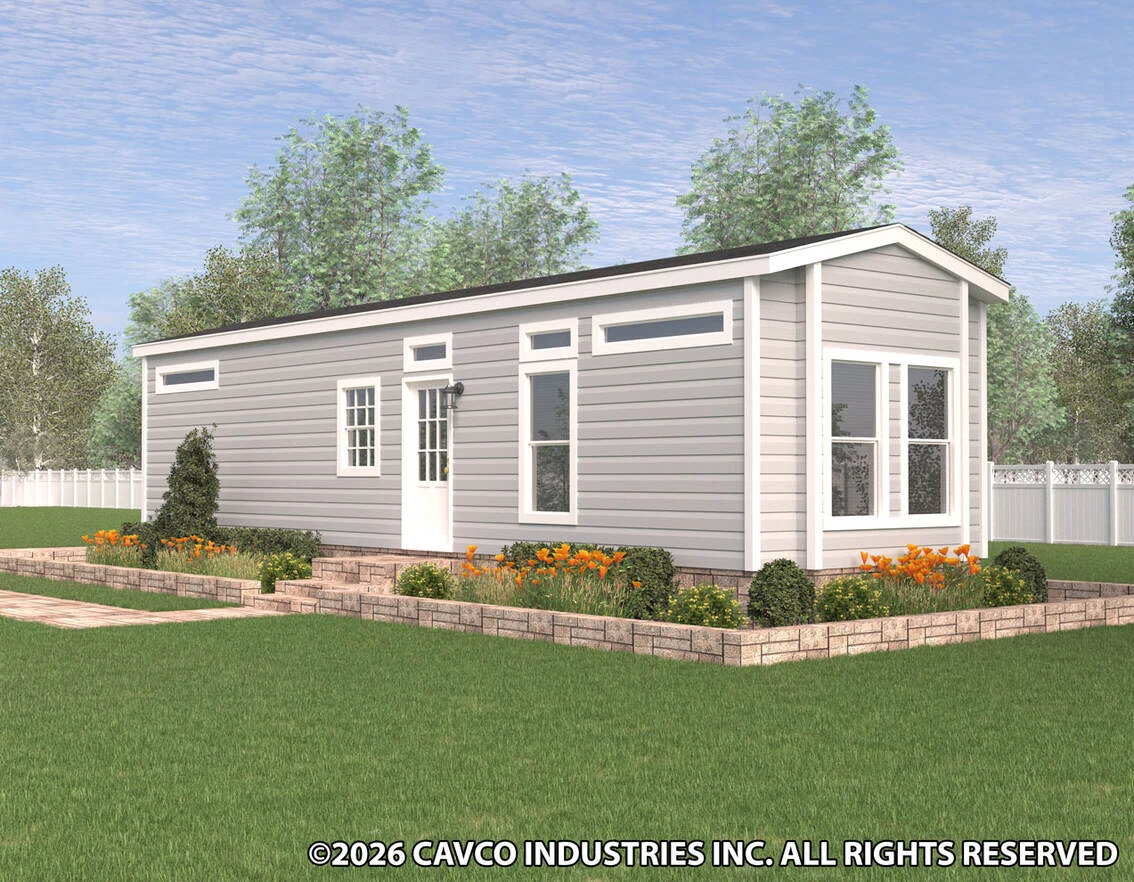 36hk12422e_rf0_1134_12 A modern tiny house with light gray siding, white trim, and a gable roof, surrounded by landscaping and a manicured lawn, shown under a partly cloudy sky.