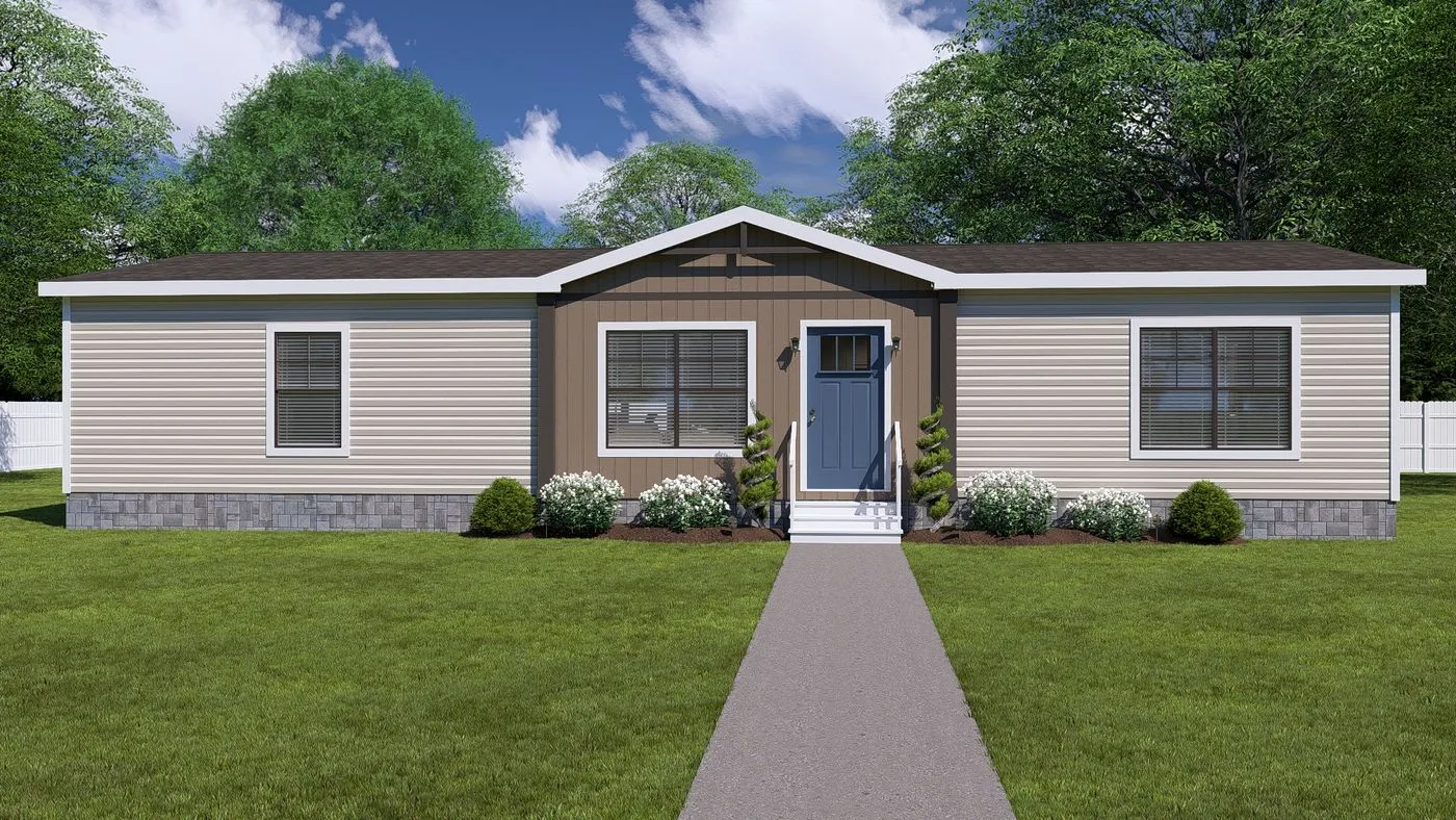 Lizzie01 A single-story manufactured home with beige siding, a gray front door, and a small landscaped garden, set against a grassy yard and clear sky.