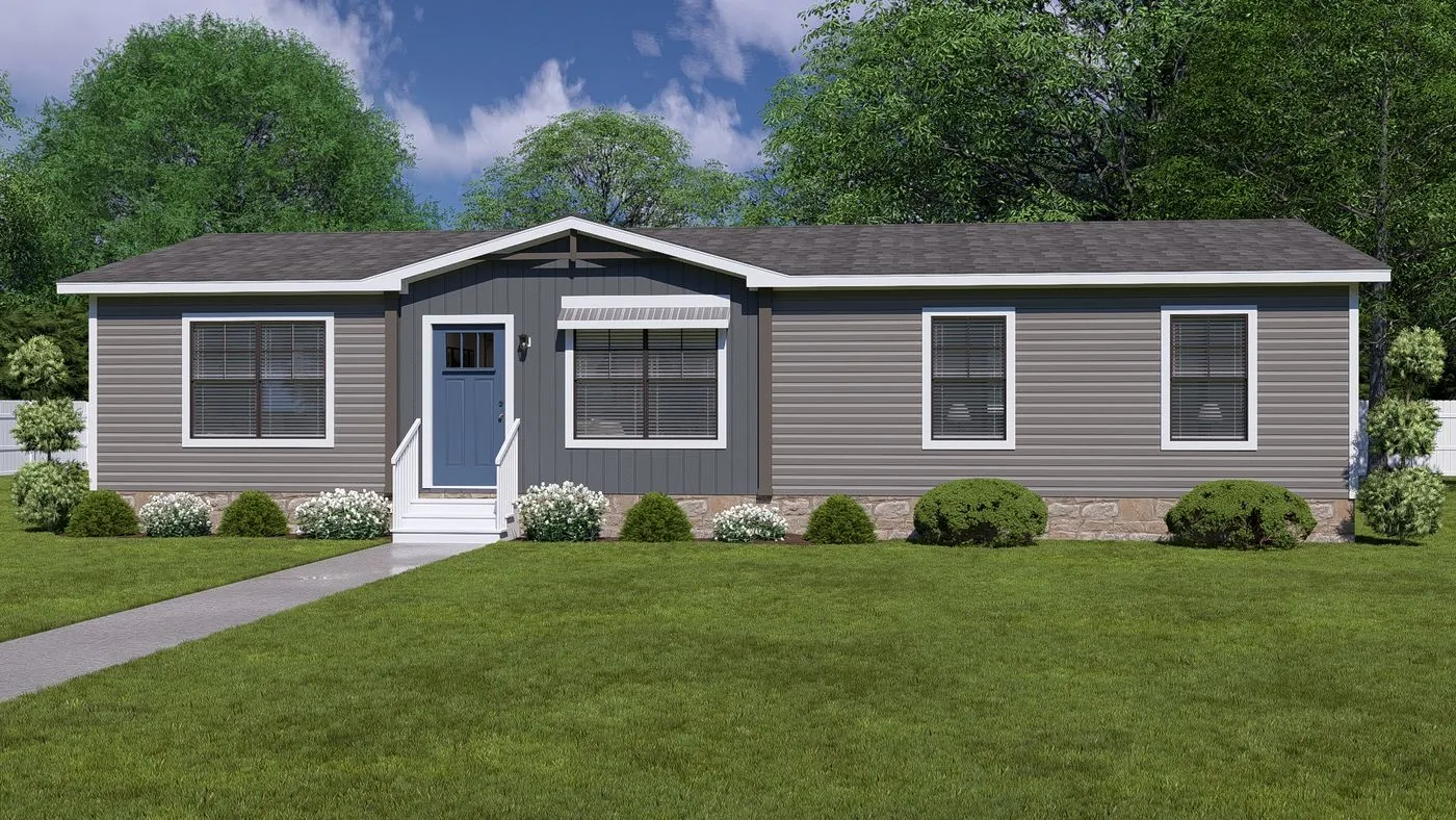 Single-story manufactured home with gray siding, a central front door, white trim, three front windows, small awning, shrub landscaping, and a lawn with a sidewalk leading to the entrance.